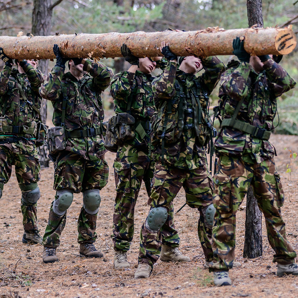 Outdoor workout in forest.Group of soldiers.